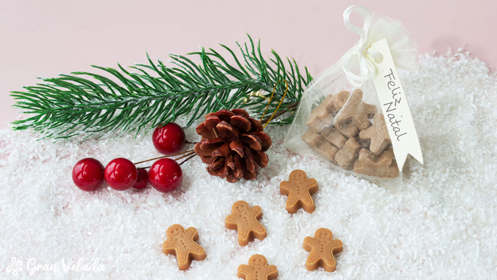Wax melts de Natal em forma de bonecos de bolacha, num saquinho com a etiqueta Feliz Natal